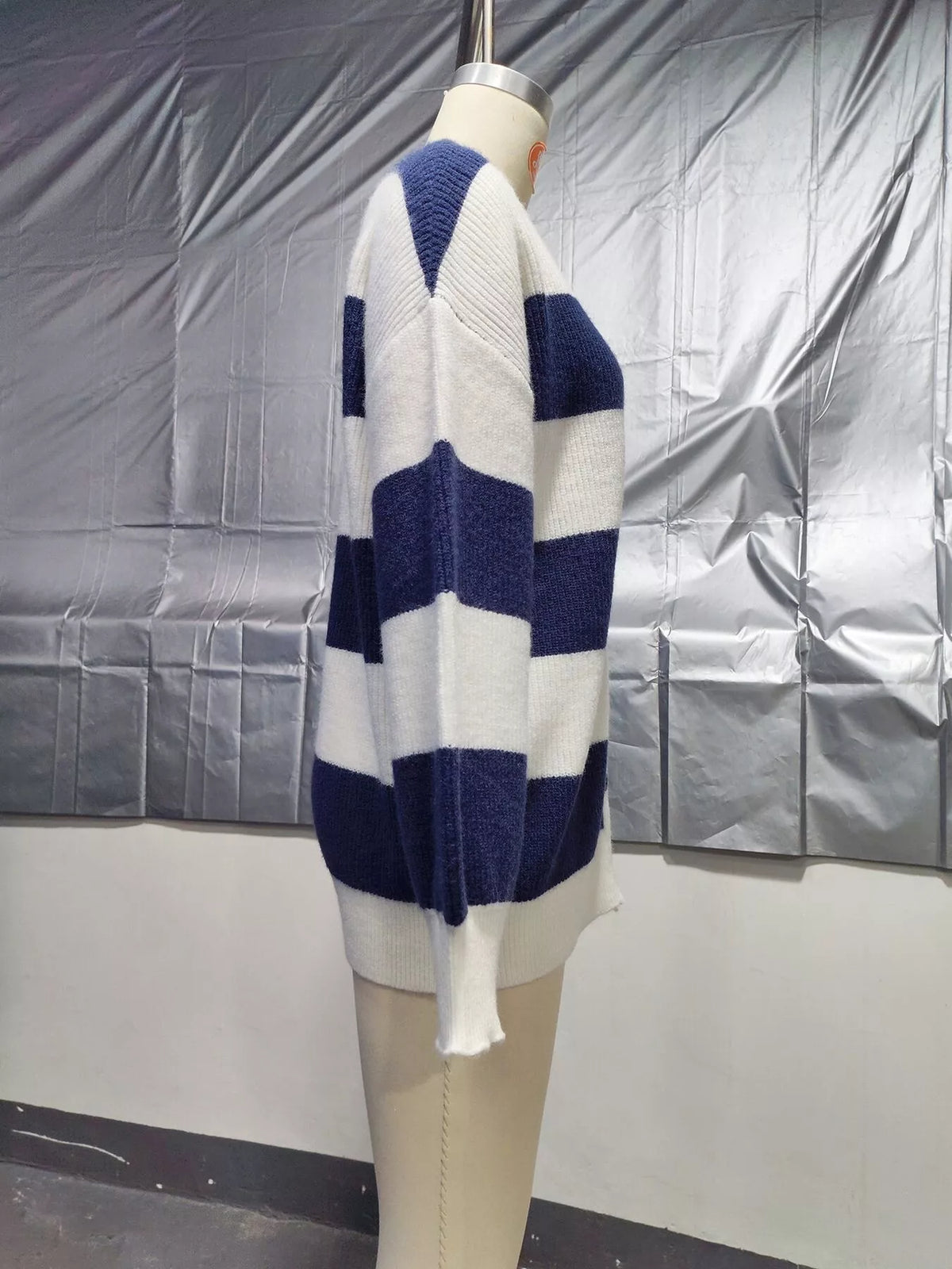 Striped cardigan, navy and white side