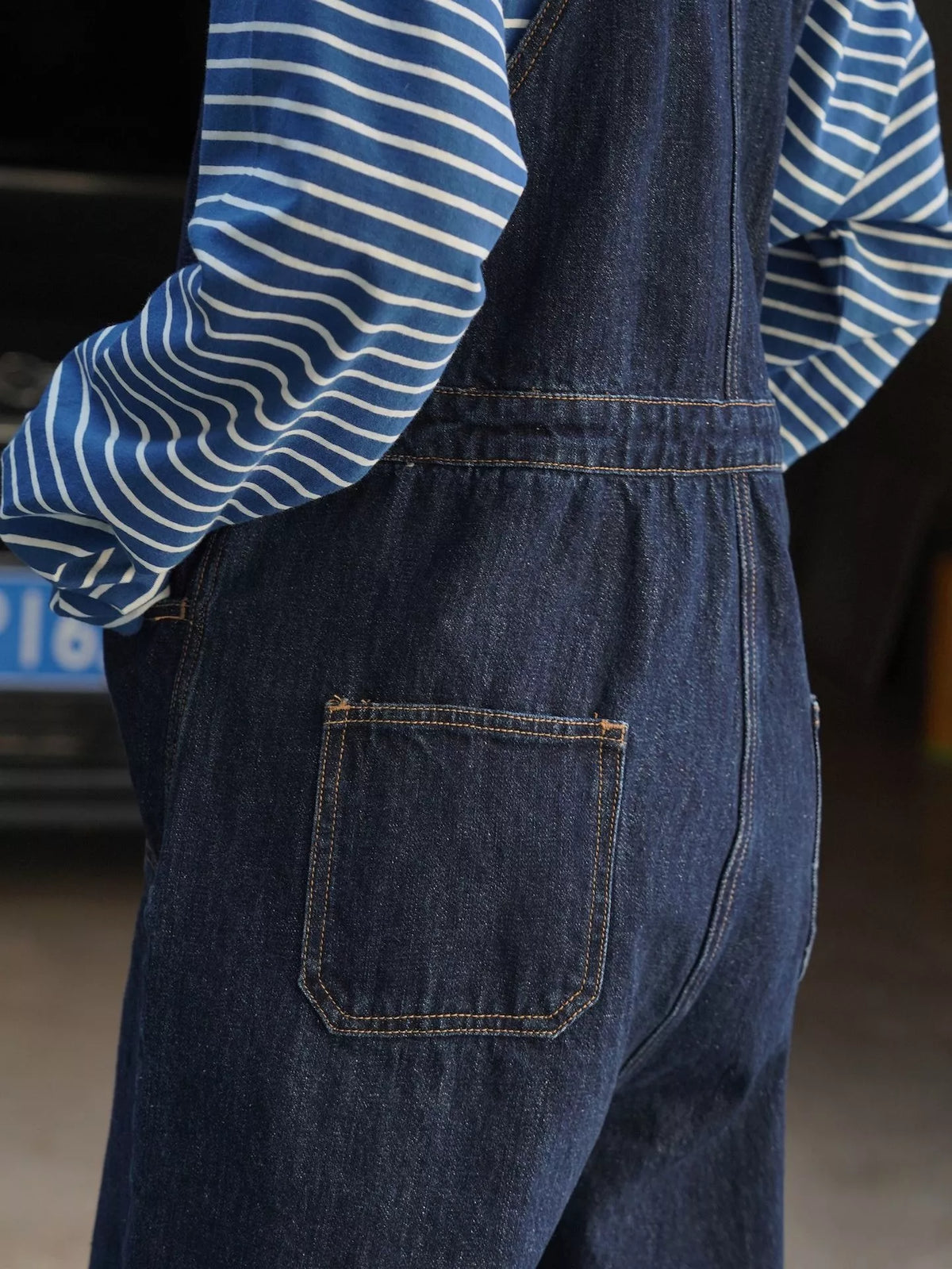 Women's Vintage Dark Wash Wide-Leg Denim Overalls in dark blue — back pocket detail view