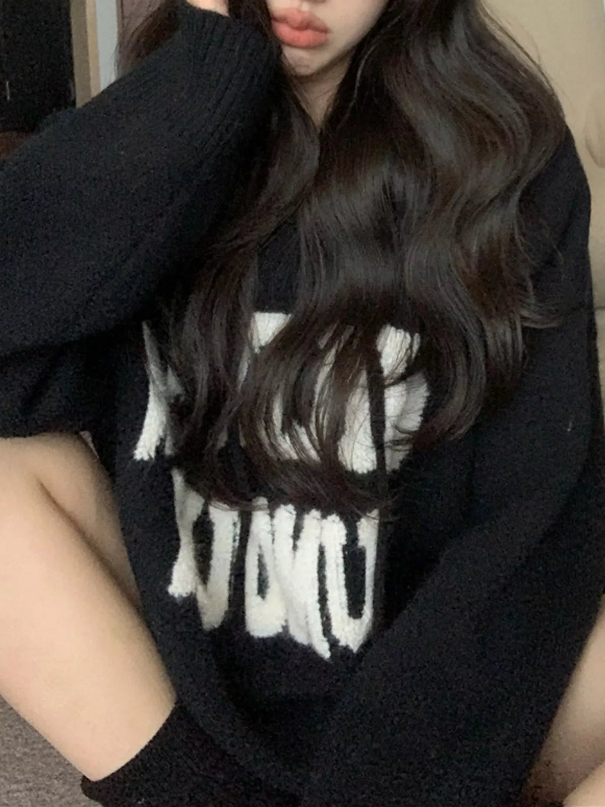 Graphic long-sleeve sweater, garment detail