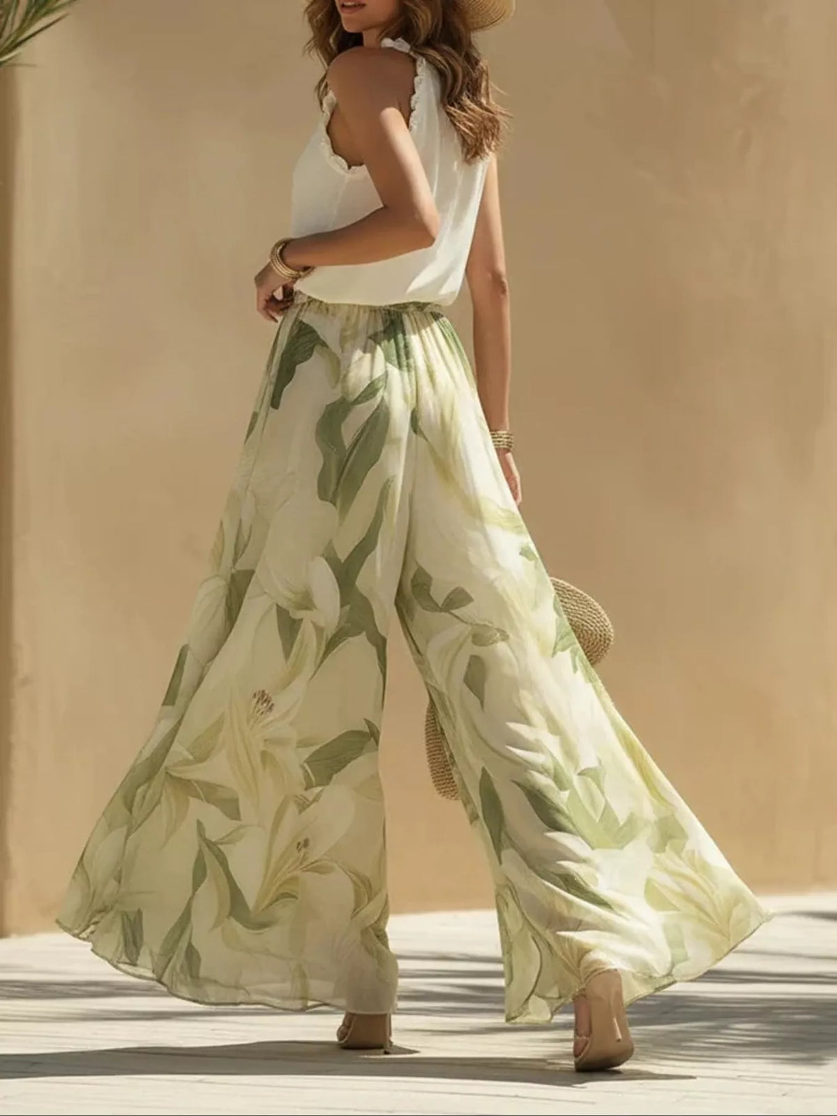 Cream and green ruffled sleeveless top and pants set, set back side view