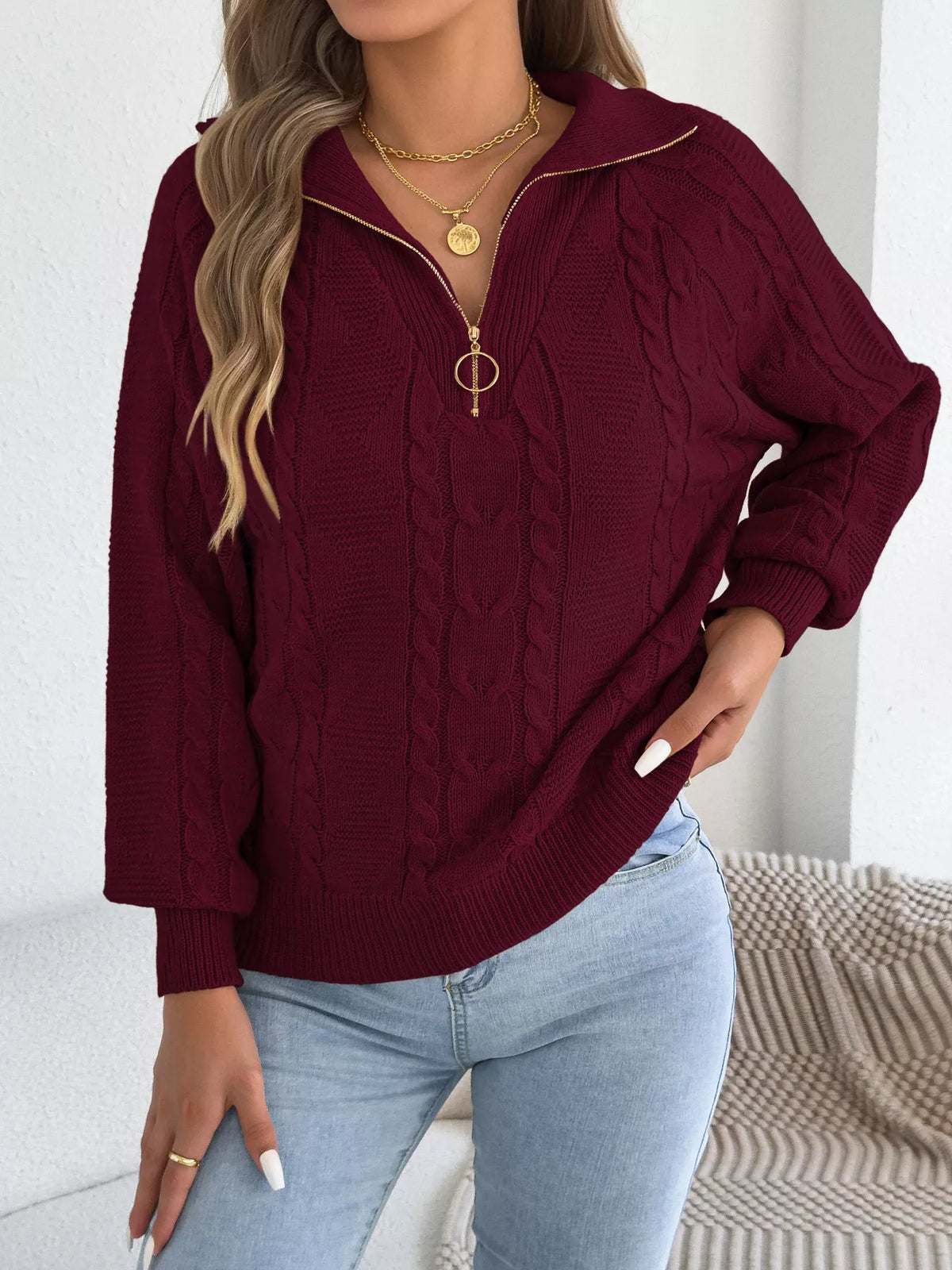 Burgundy quarter-zip cable knit sweater