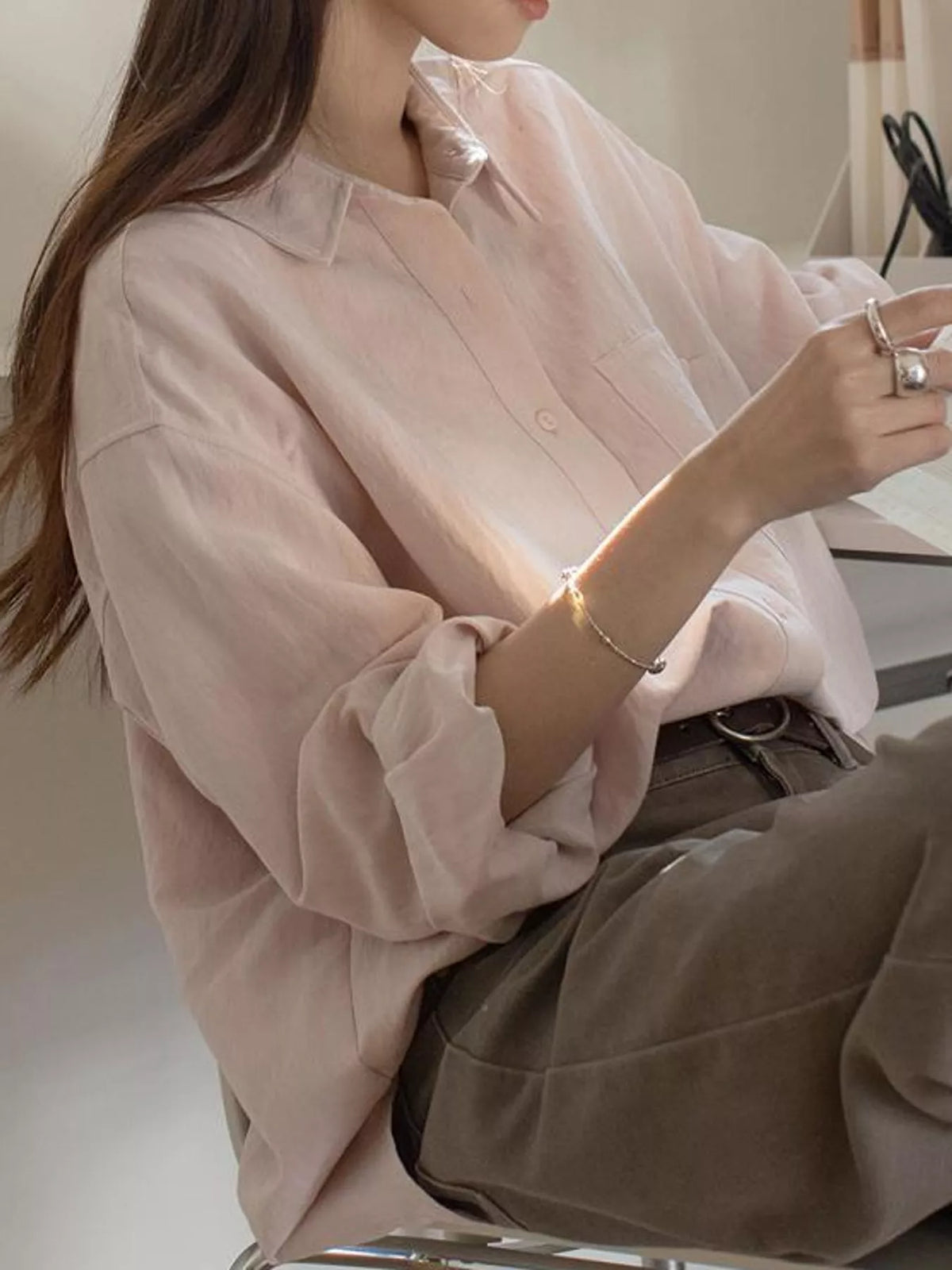 Pink button down long sleeve shirt, front view