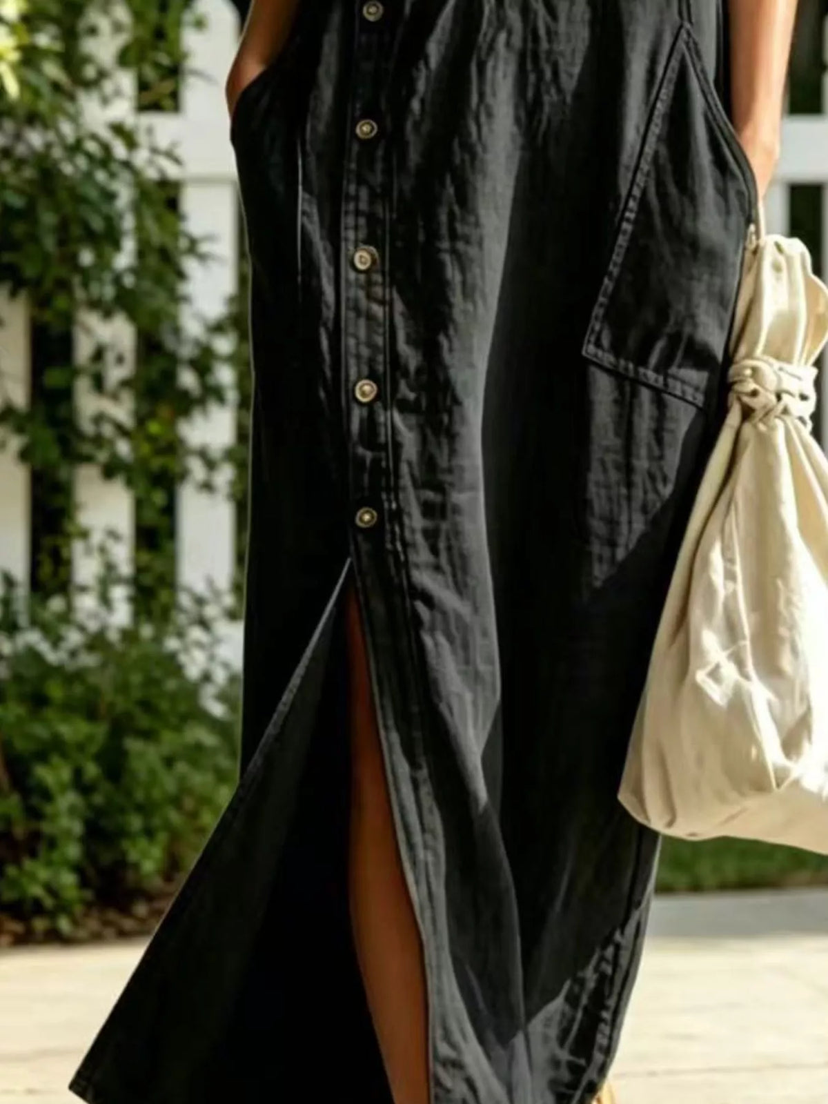 Black sleeveless hooded dress, button and slit detail
