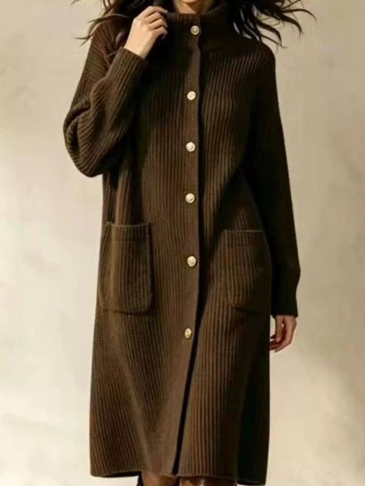 Brown ribbed turtleneck longline cardigan, button and pocket view