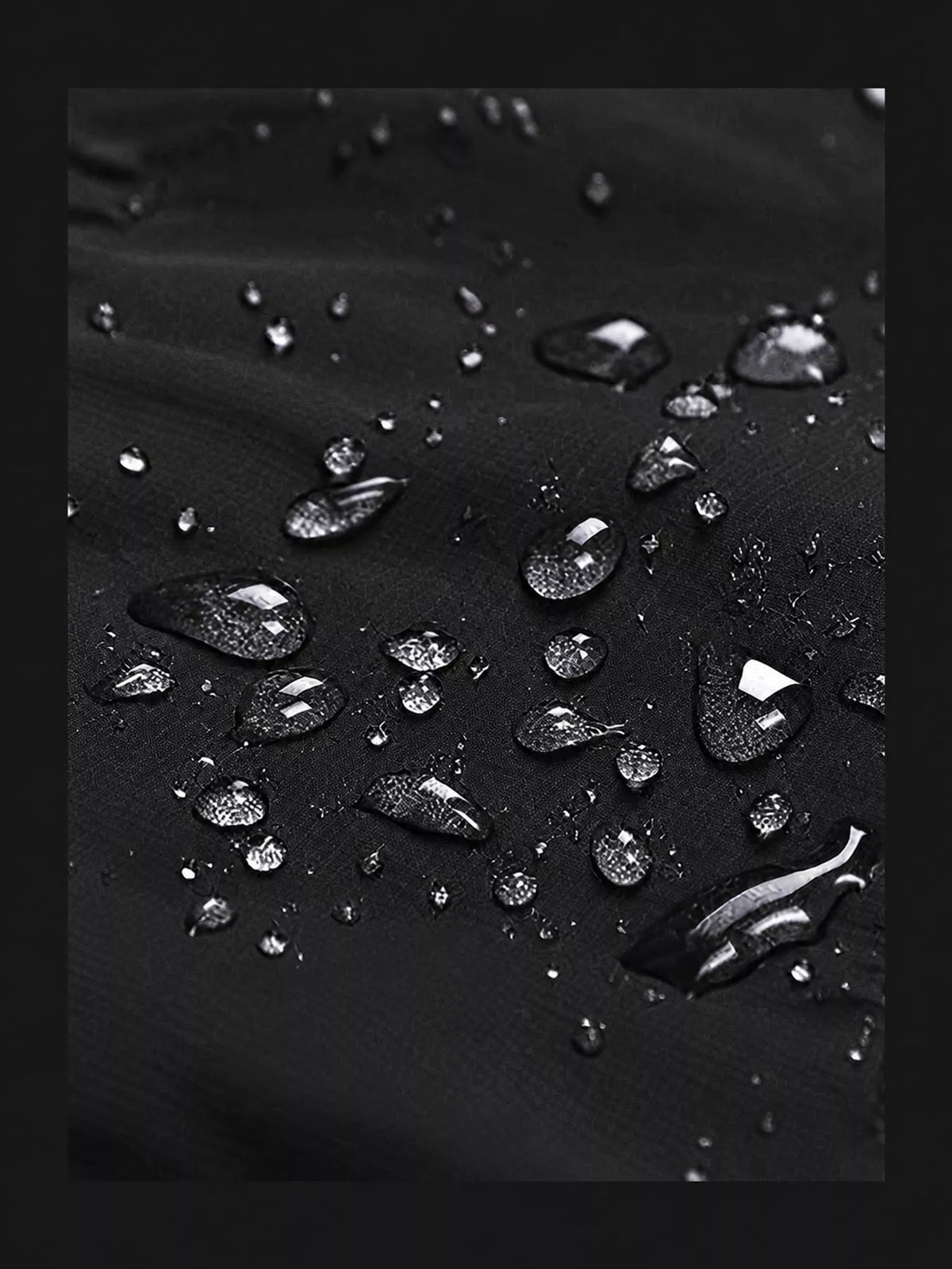 Black drawstring hooded jacket, detail view