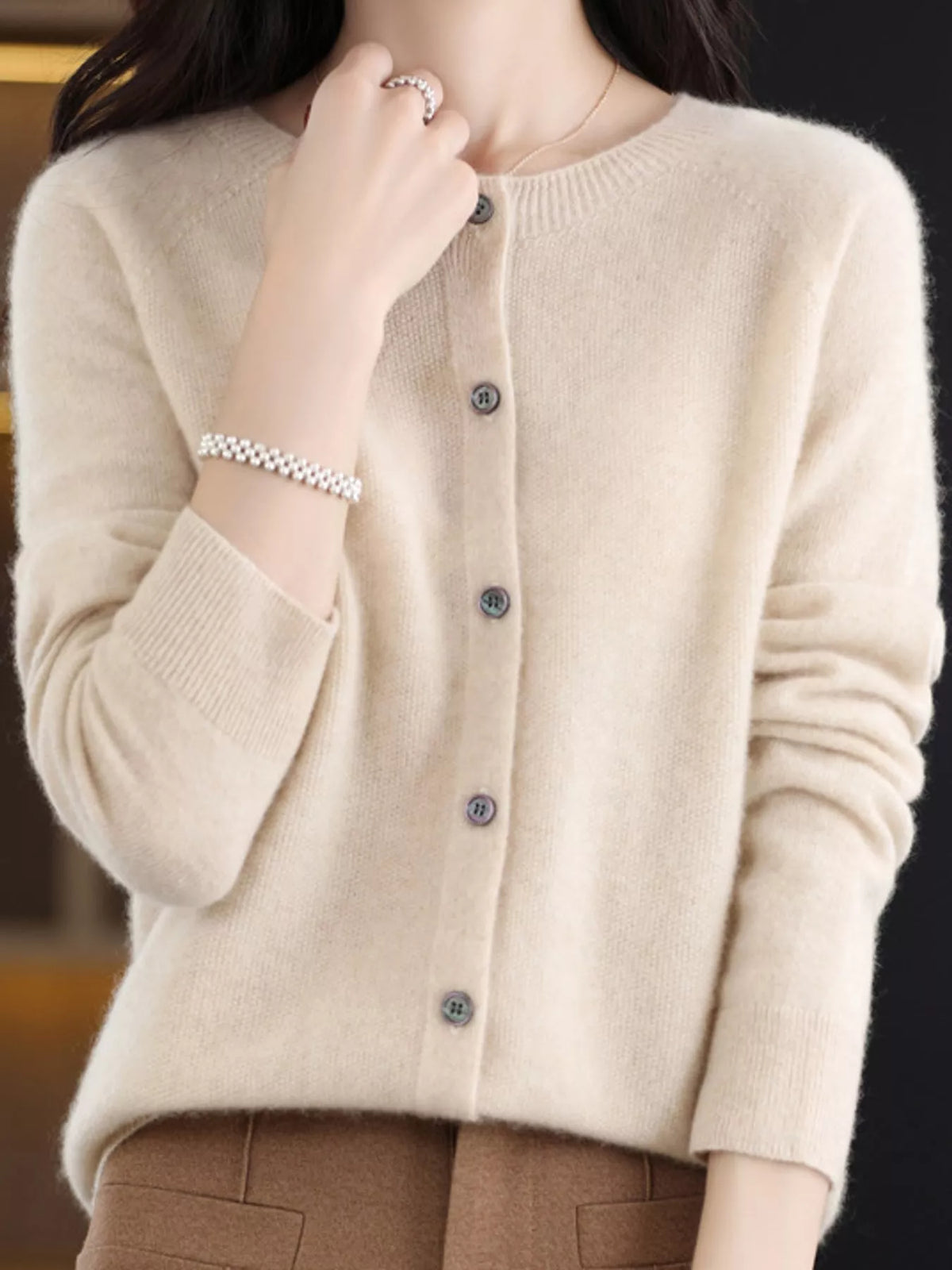Round neck long sleeve cardigan, front view on model