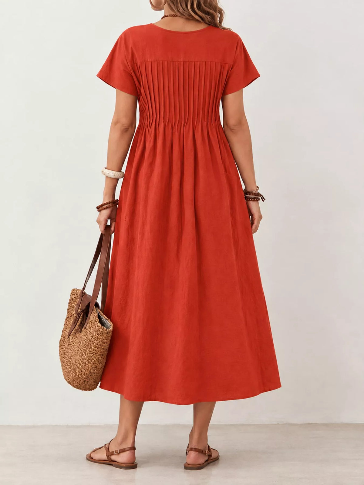 Pleated Midi Dress with Pockets, back view in rust