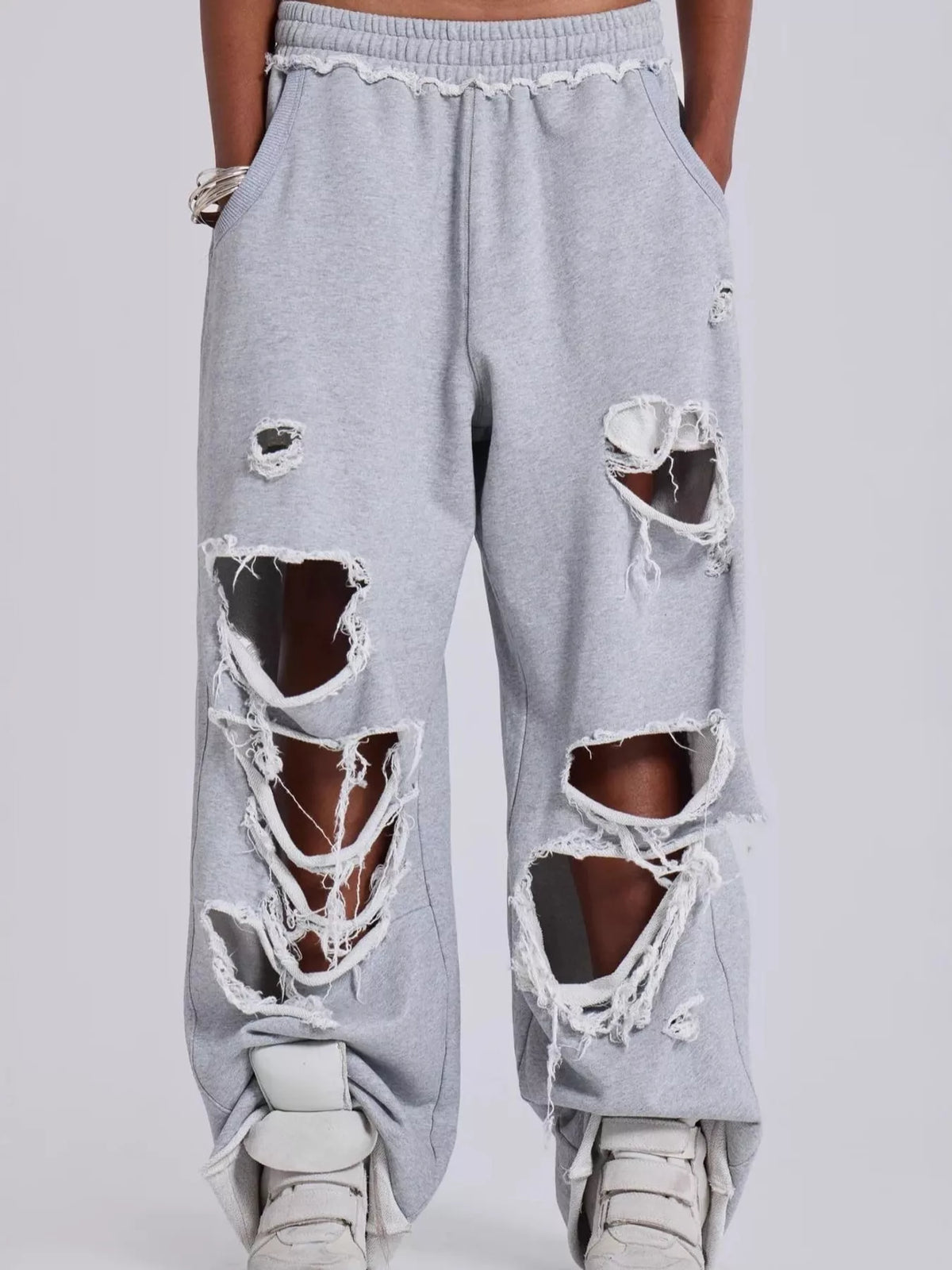 Distressed high-waisted wide-leg sweatpants, detail view