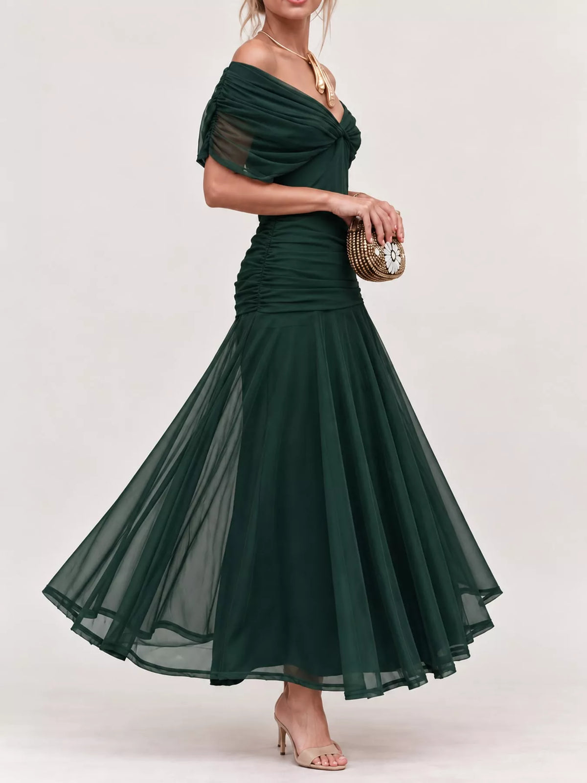 Green off shoulder ruched tulle evening dress, side view