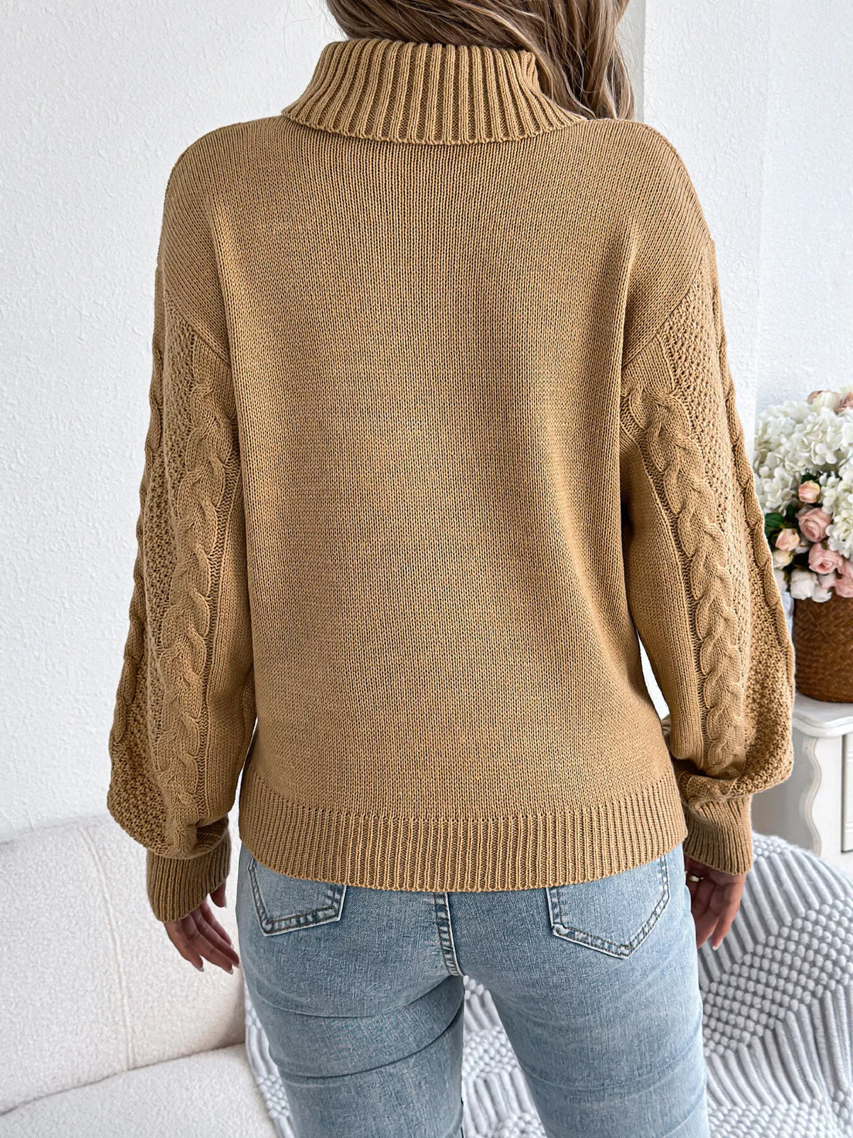 Khaki cable knit turtleneck sweater, back view