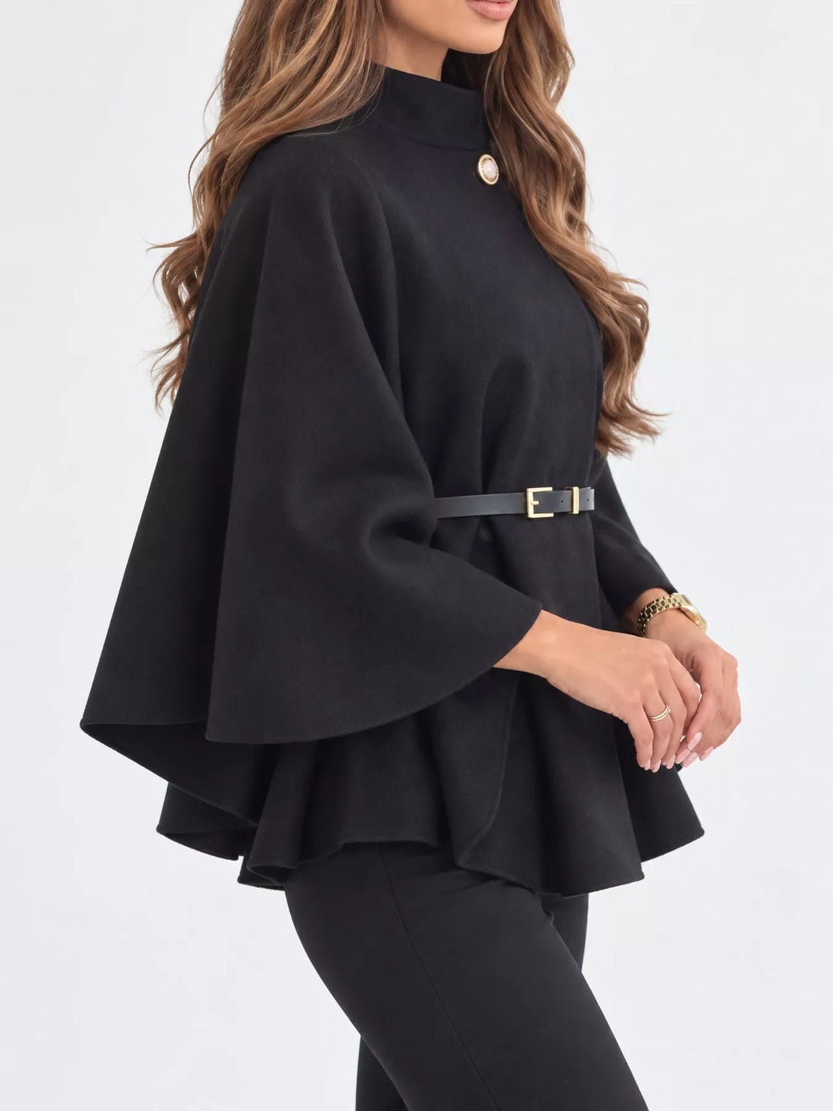 Belted Mock Neck Cape in black, side view