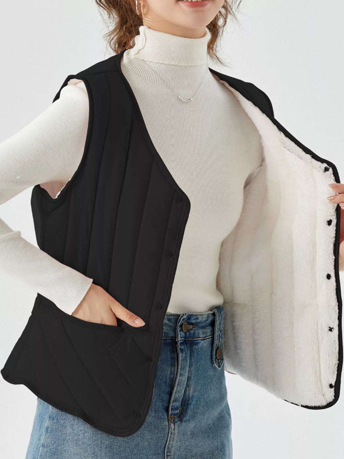 Quilted Button Up Vest in black, front view