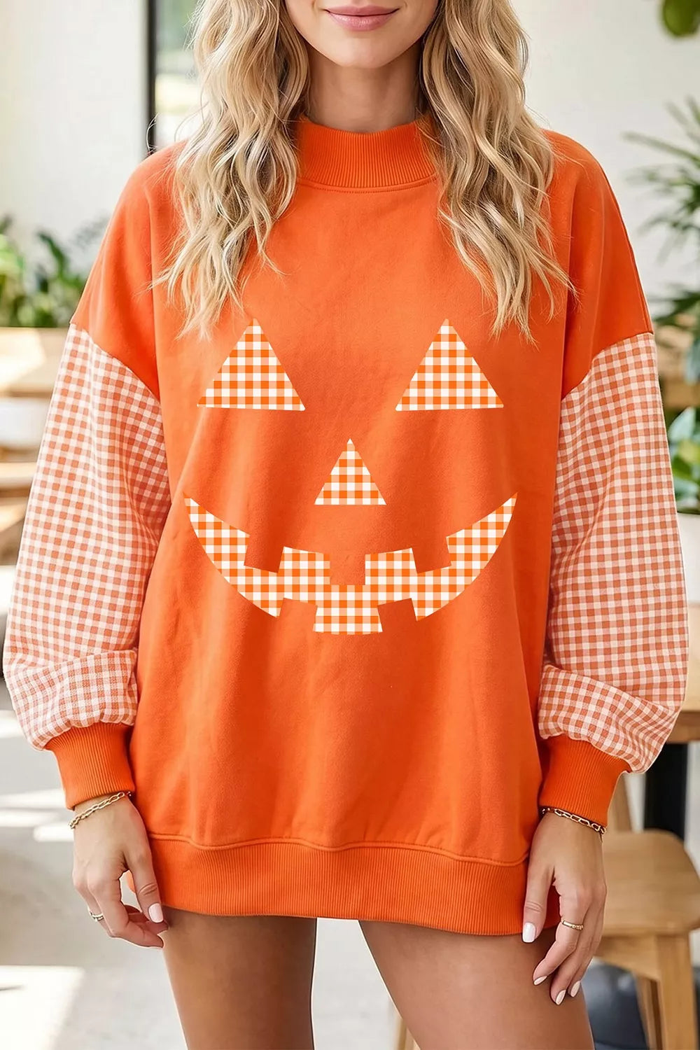 Women's plaid-sleeve pumpkin face Halloween sweatshirt