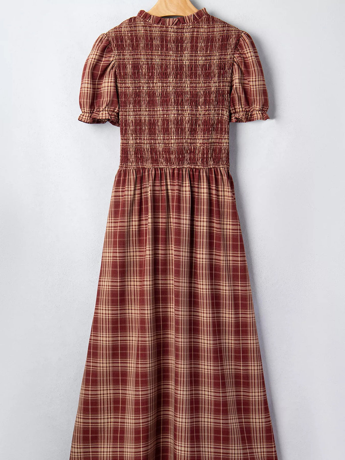 Plaid smocked dress, hanging back