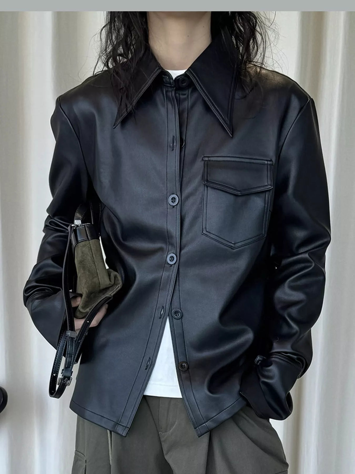 Black faux leather button-front jacket — front view