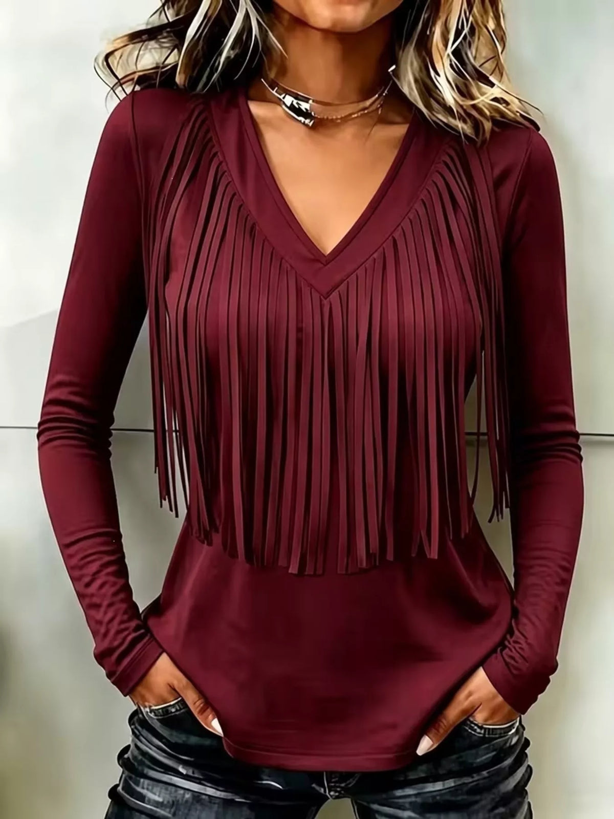 Burgundy fringe V-neck top, front view