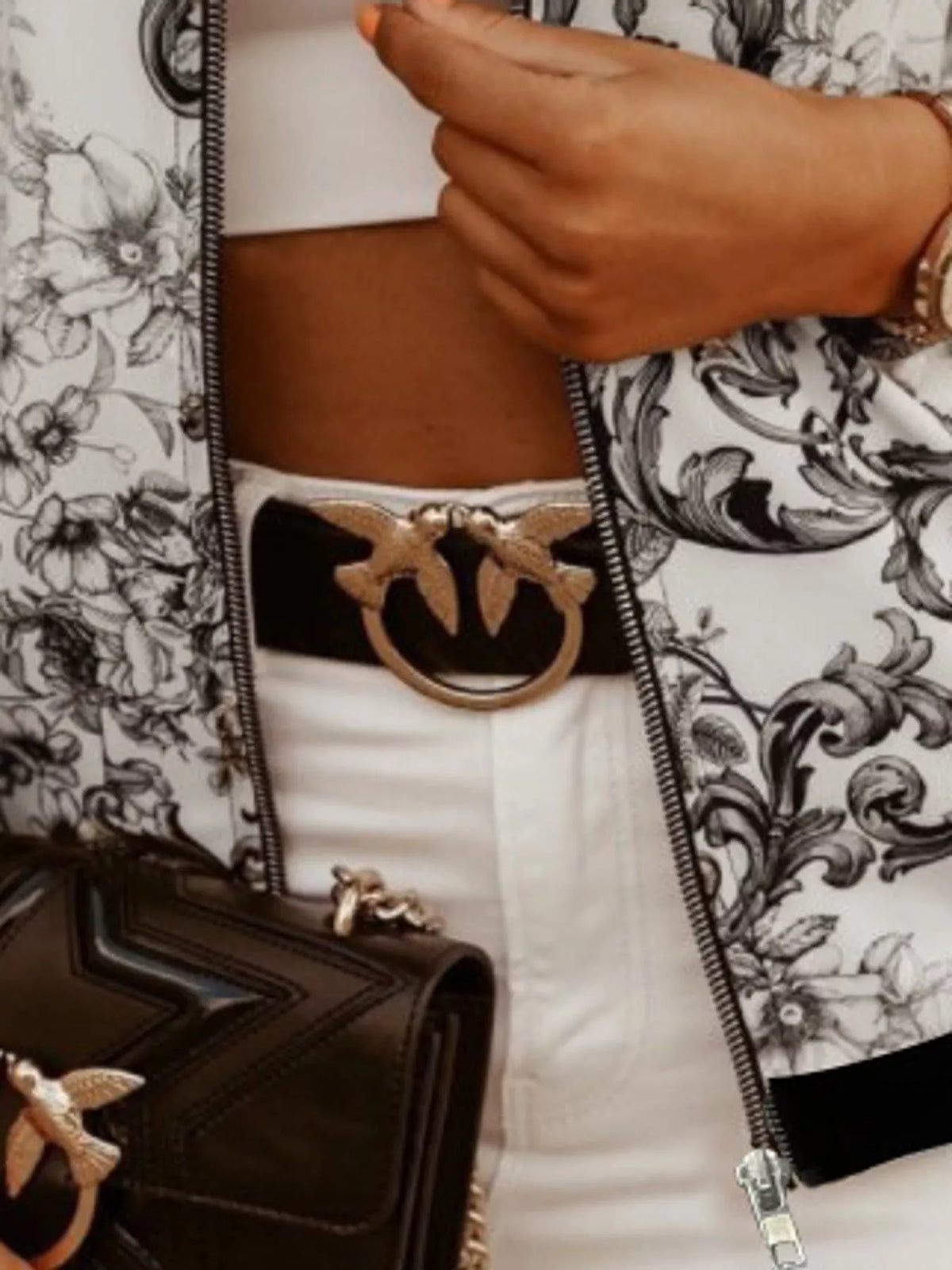 Black and white scroll printed zip-up bomber jacket — design and construction details