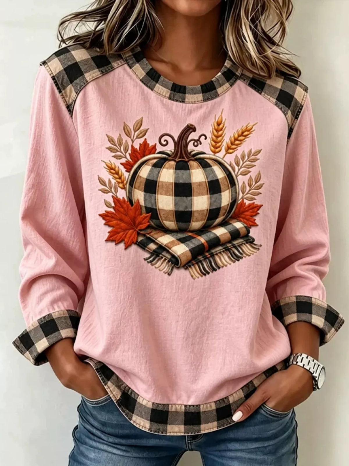 Pink pumpkin-patchwork sweatshirt, front view