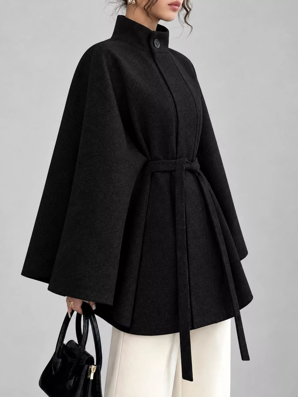 Black tie-waist cape — side view