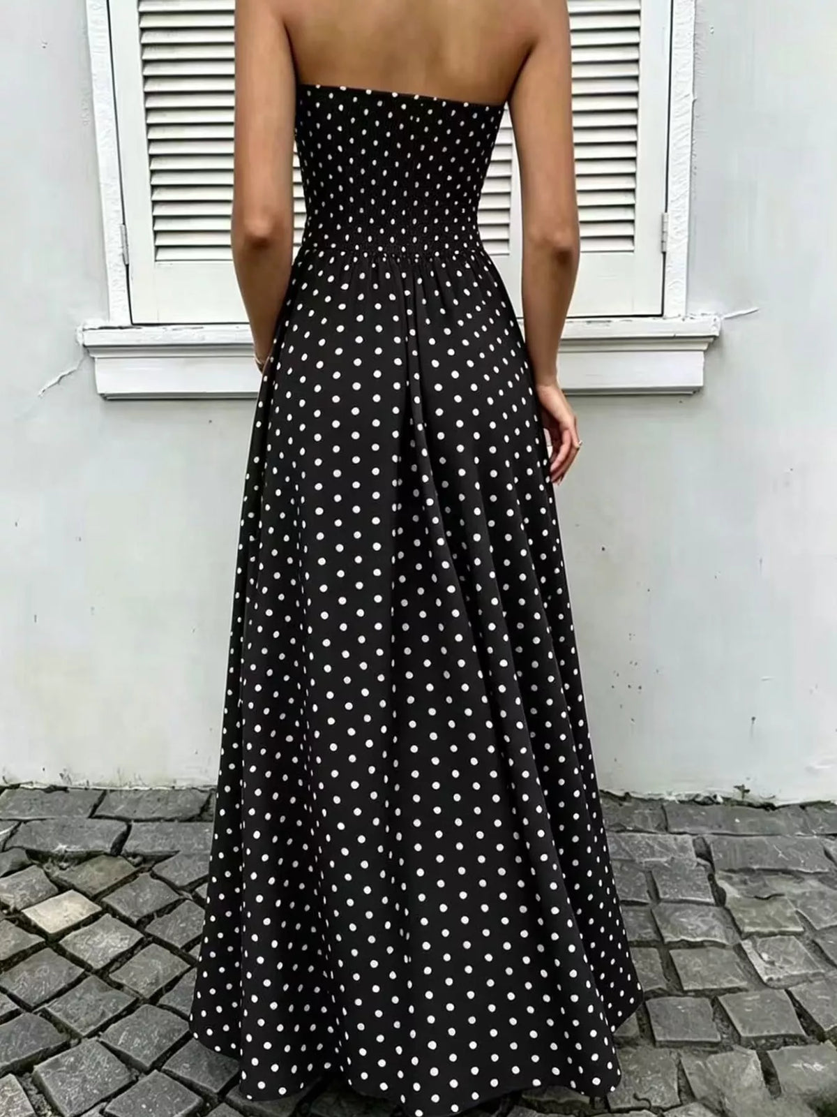 Women's Strapless Polka Dot Ruched Maxi Dress in black dots — back view