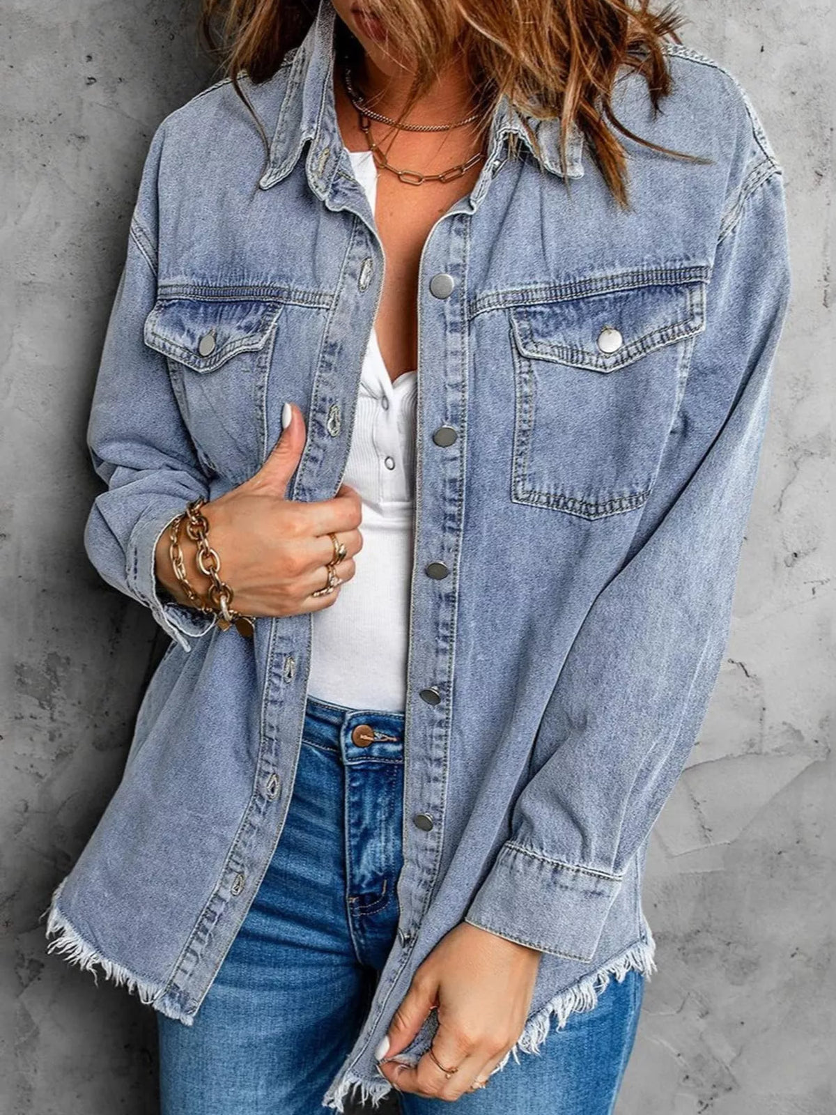 Blue raw hem button-up denim jacket — front view