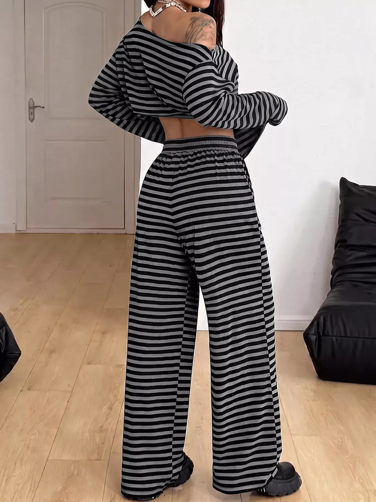 Off-Shoulder Striped Long Sleeve Top and Wide Leg Pants Set, back view in black and white