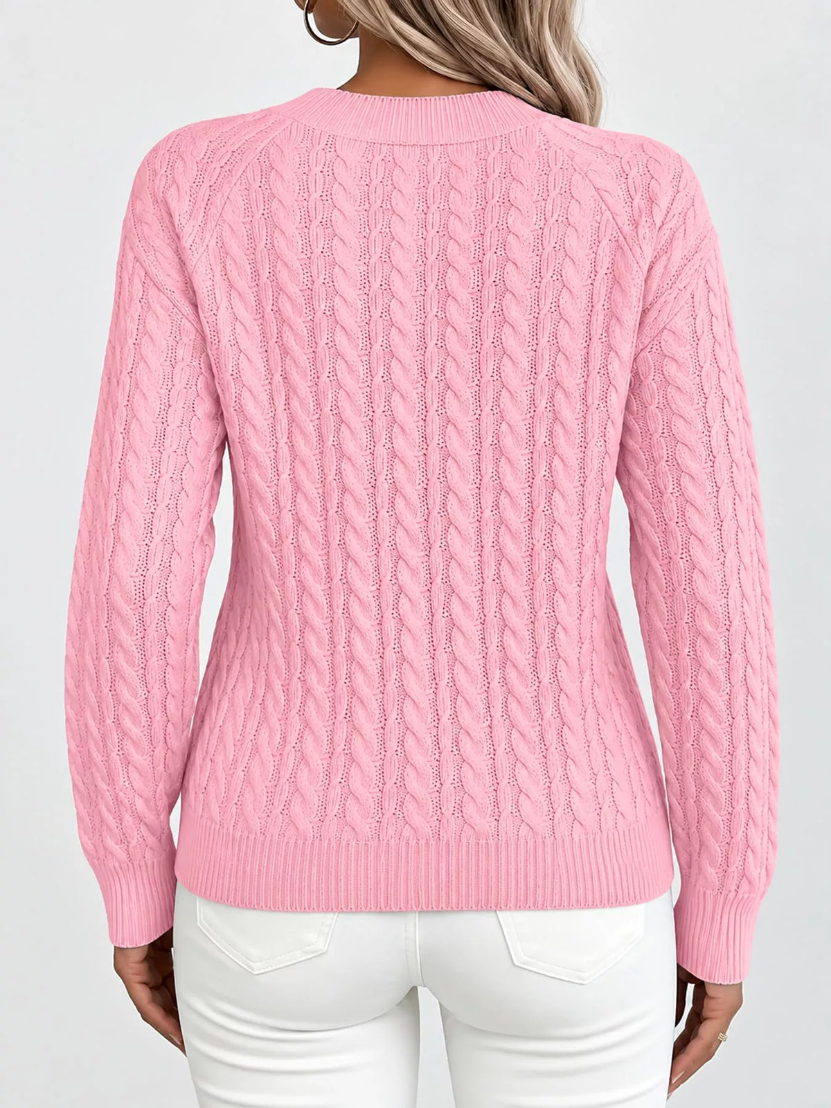 Pink cable knit round neck sweater, back view