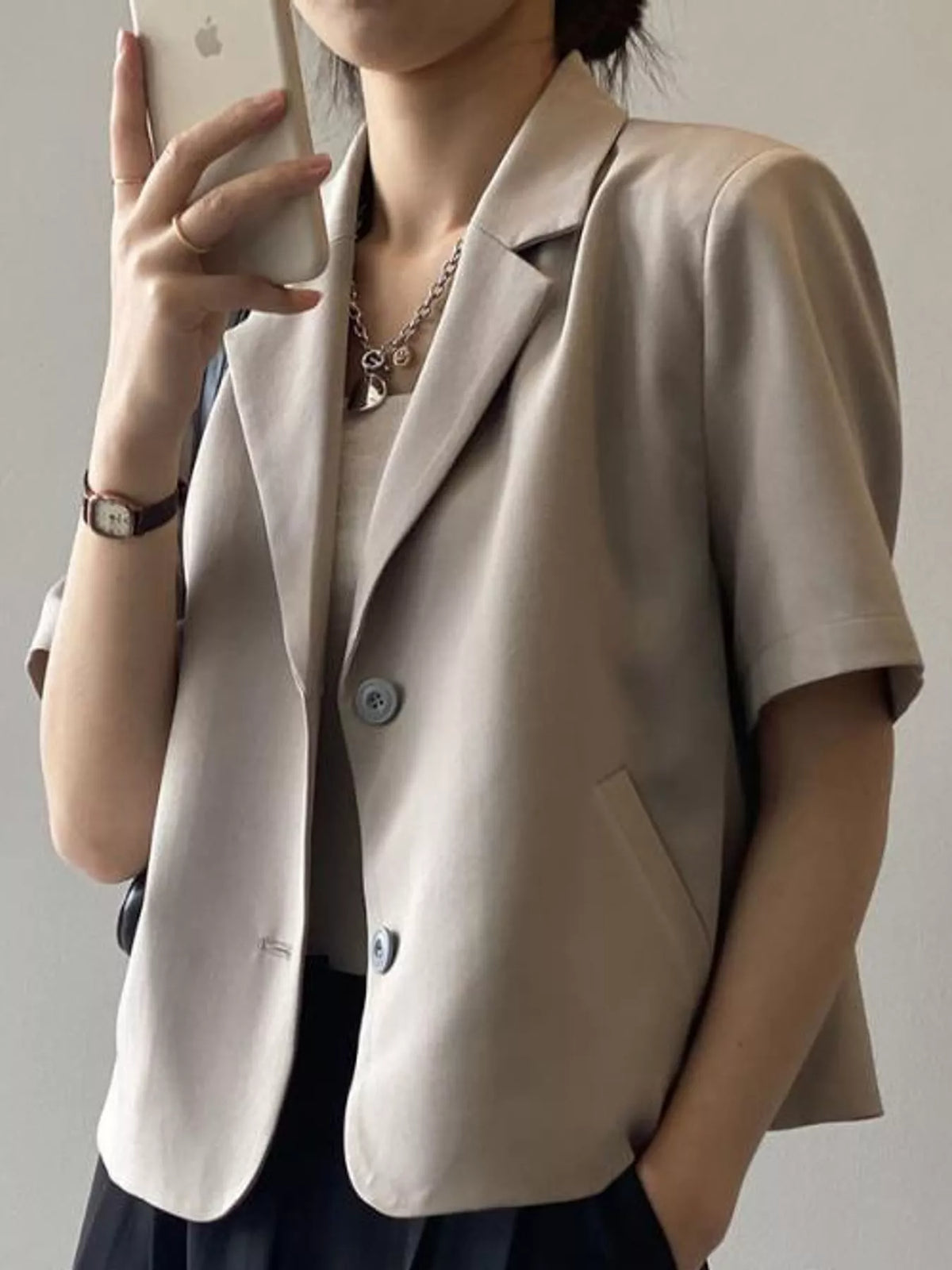 Collared short sleeve blazer, front view on model