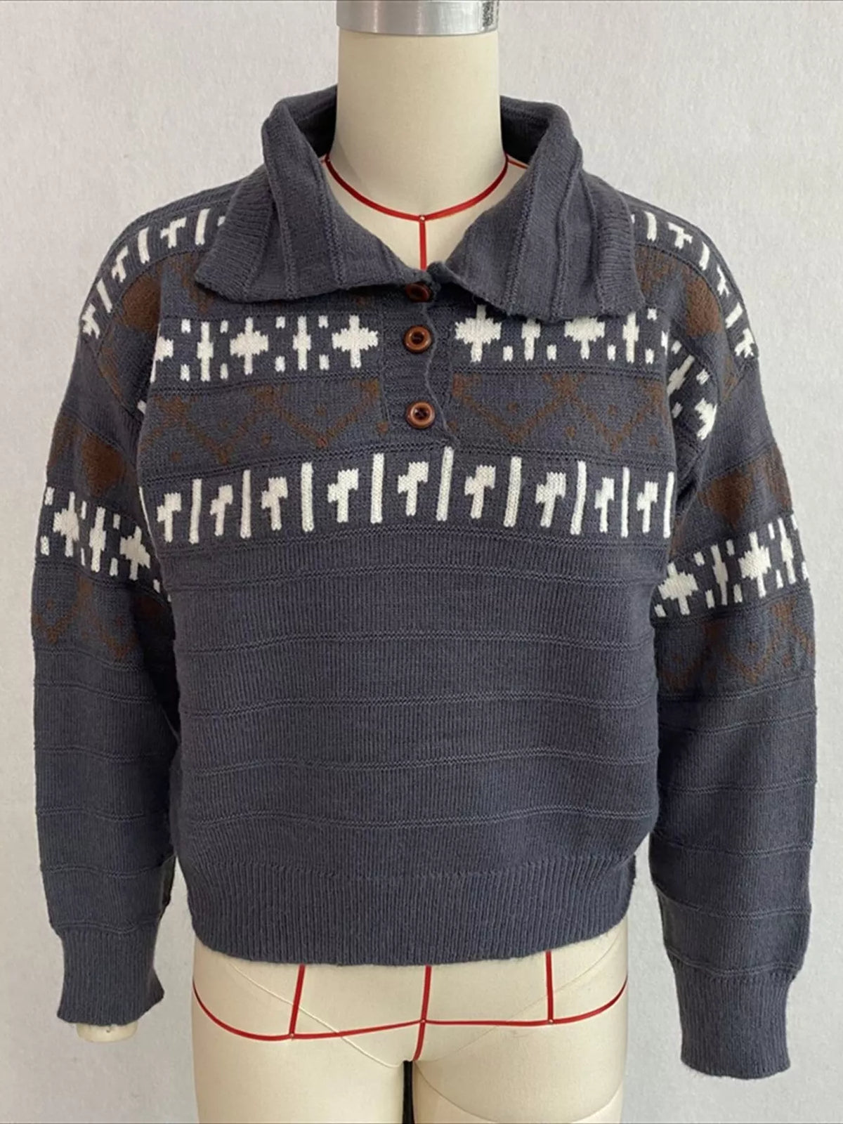 Charcoal fair isle polo-collar sweater, front on dress form.
