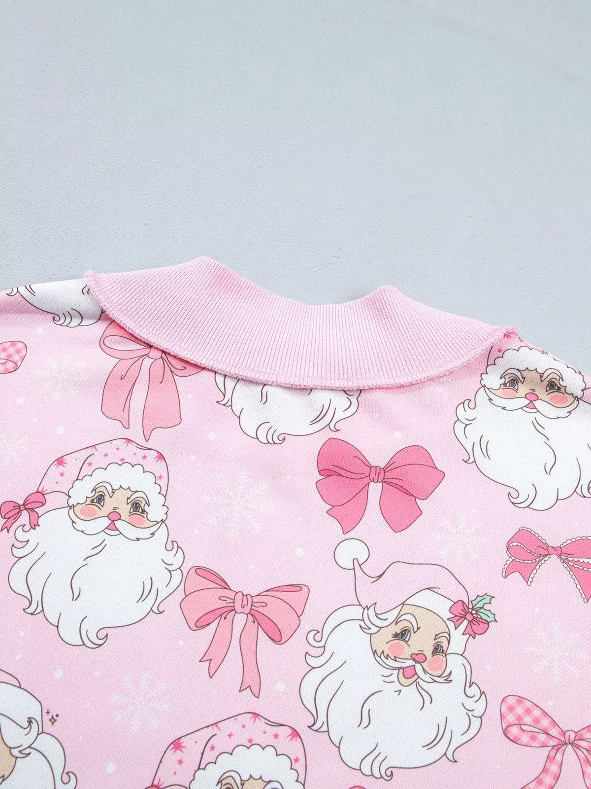 Santa-and-bow sweatshirt, back neck detail