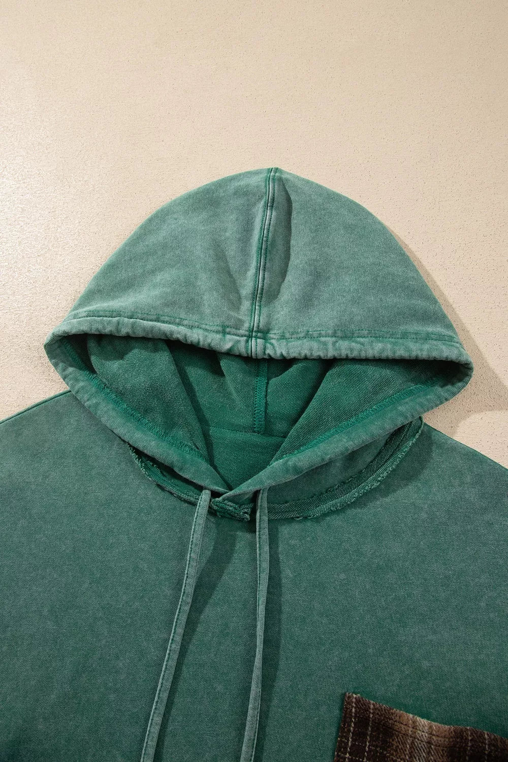 Plaid Kangaroo Pocket Hoodie in green, hood front detail