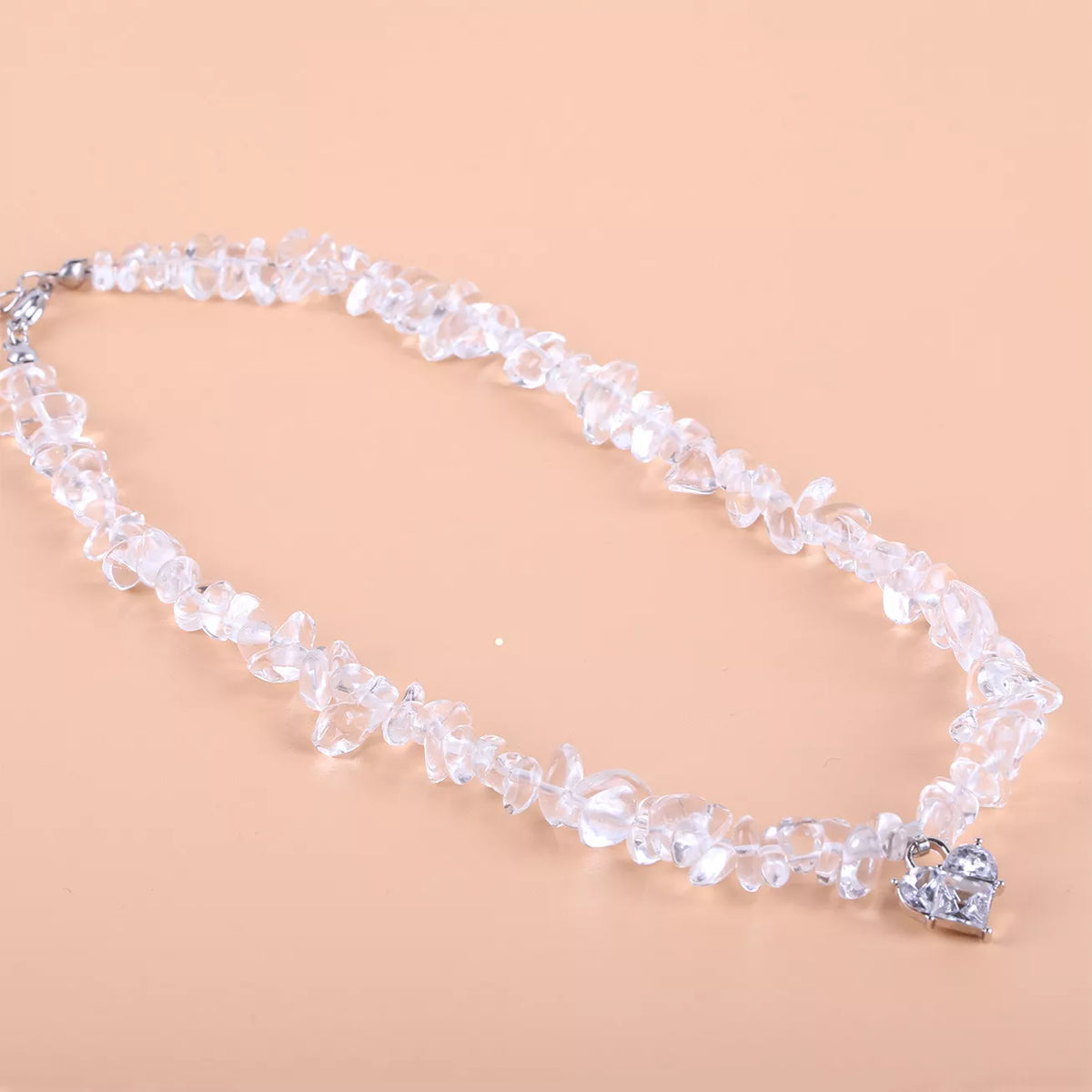 Silver crystal-chip heart pendant necklace, detail view
