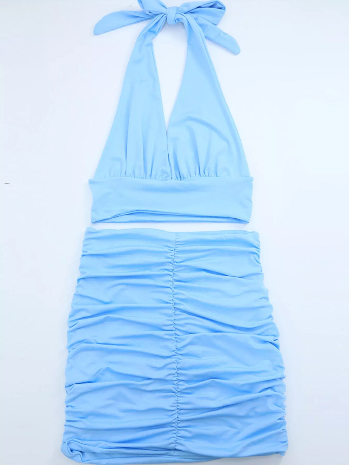 Blue halter crop top and ruched bodycon mini skirt set
