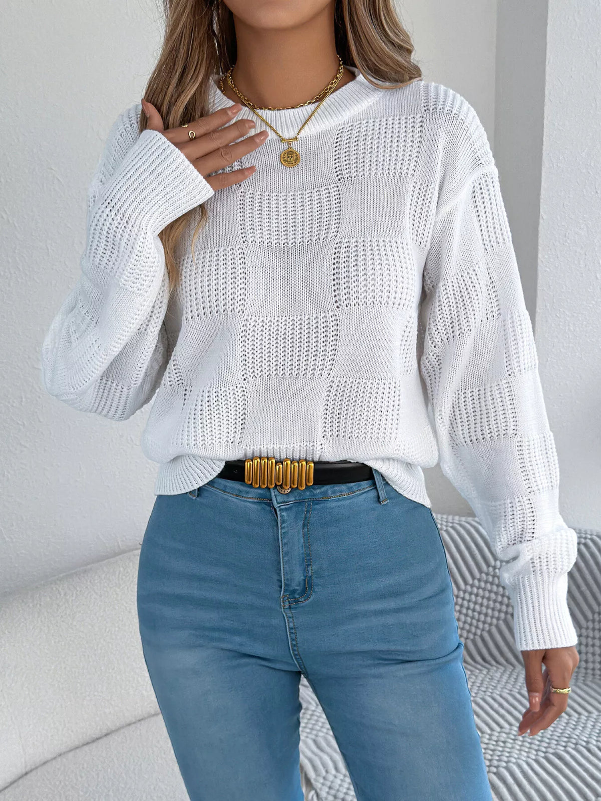 Gray checkerboard textured knit sweater