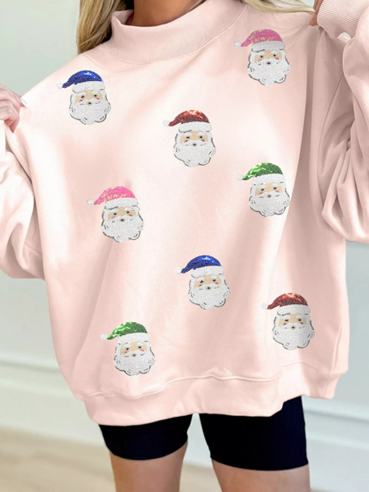 Pink Santa sequin mock neck sweatshirt — front view