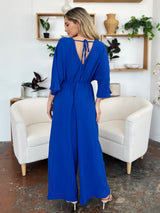 Trendsi Double Take Full Size Surplice Wide Leg Jumpsuit with Pockets -