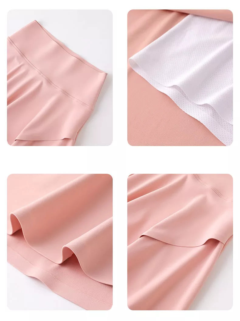 Pink flared athletic skort, waistband, built-in shorts, and wrap-style panel