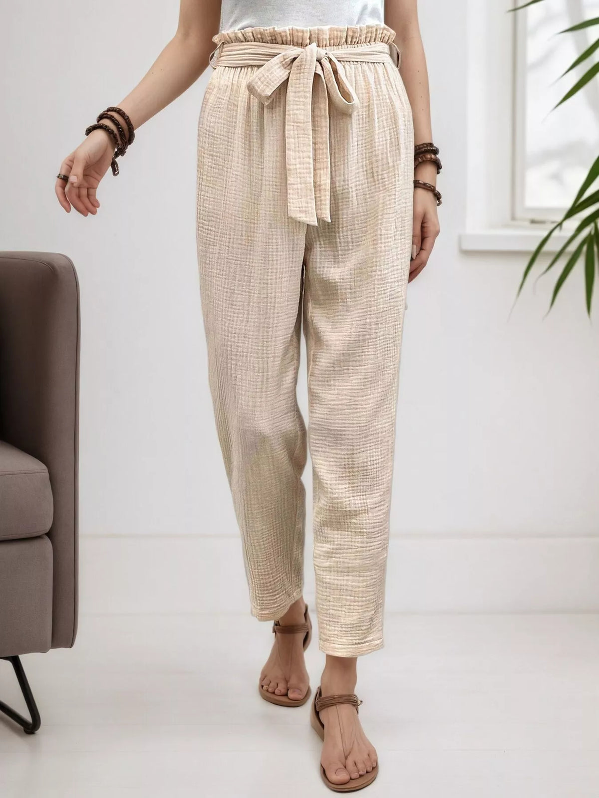Beige high waisted paperbag waist textured casual pants, front view
