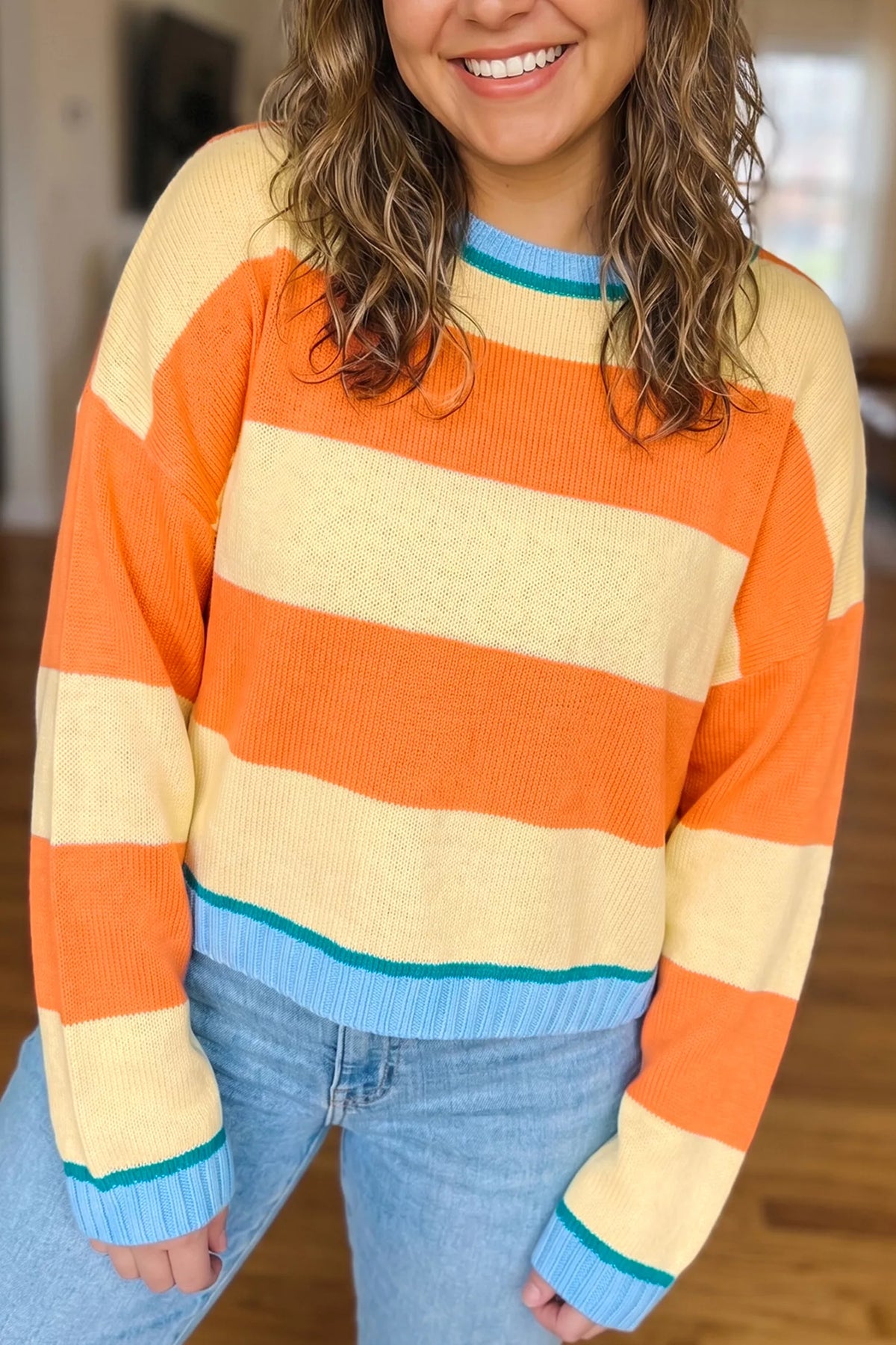 Striped colorblock sweater, orange yellow striped front