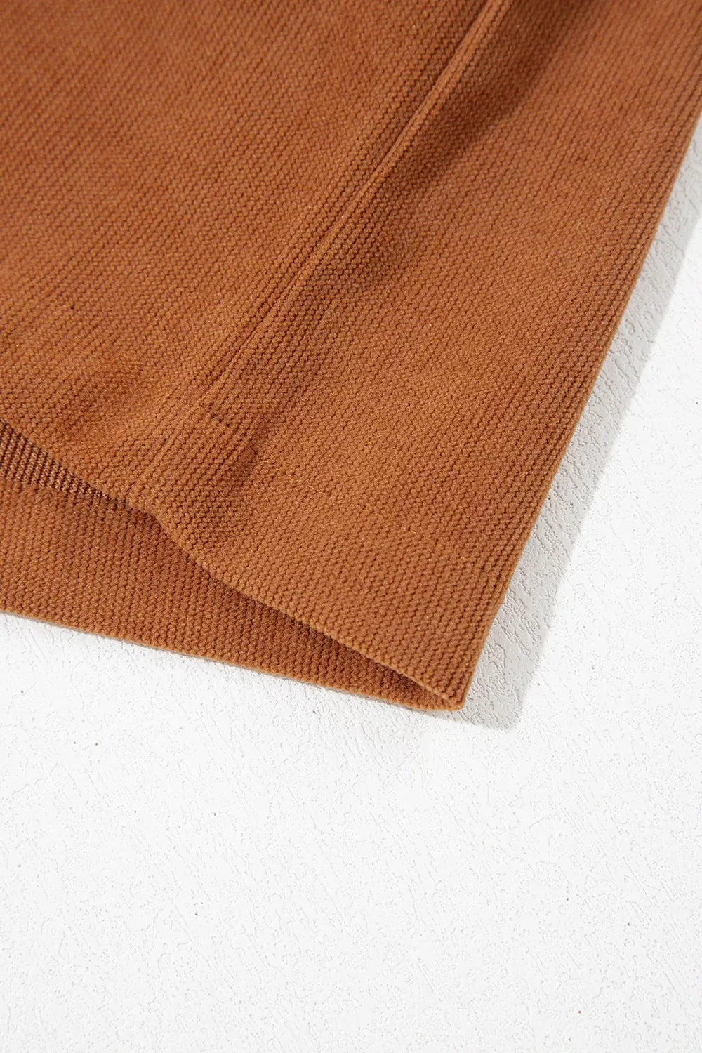 Rust brown corduroy romper, hem detail