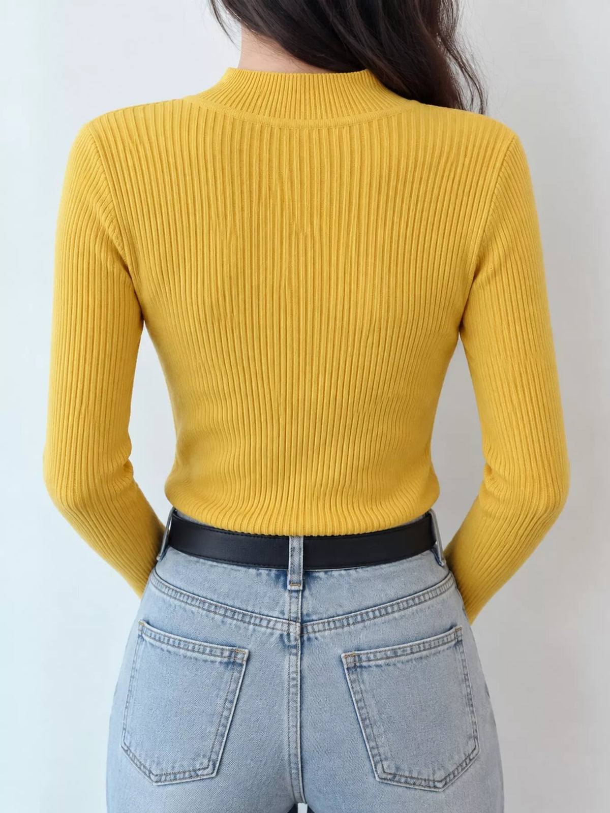 Yellow ribbed mock neck long sleeve knit top, back view