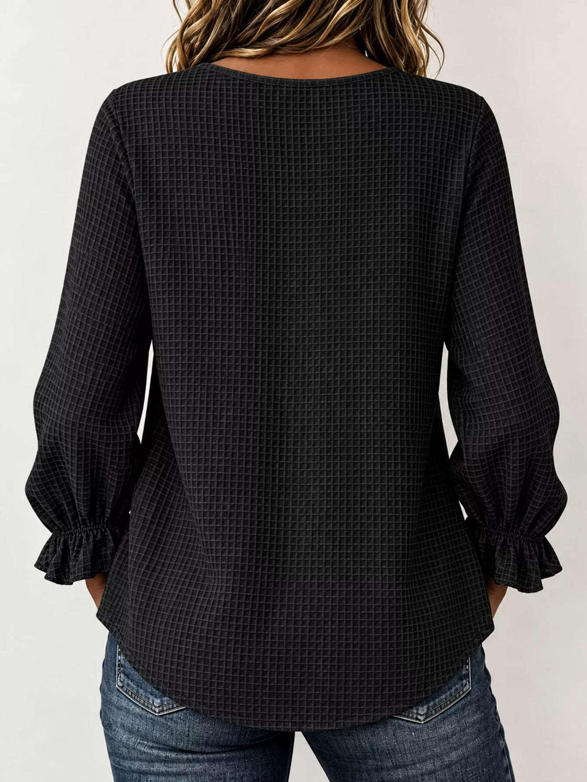 Women's Waffle Knit Flounce Sleeve Blouse in black — back view