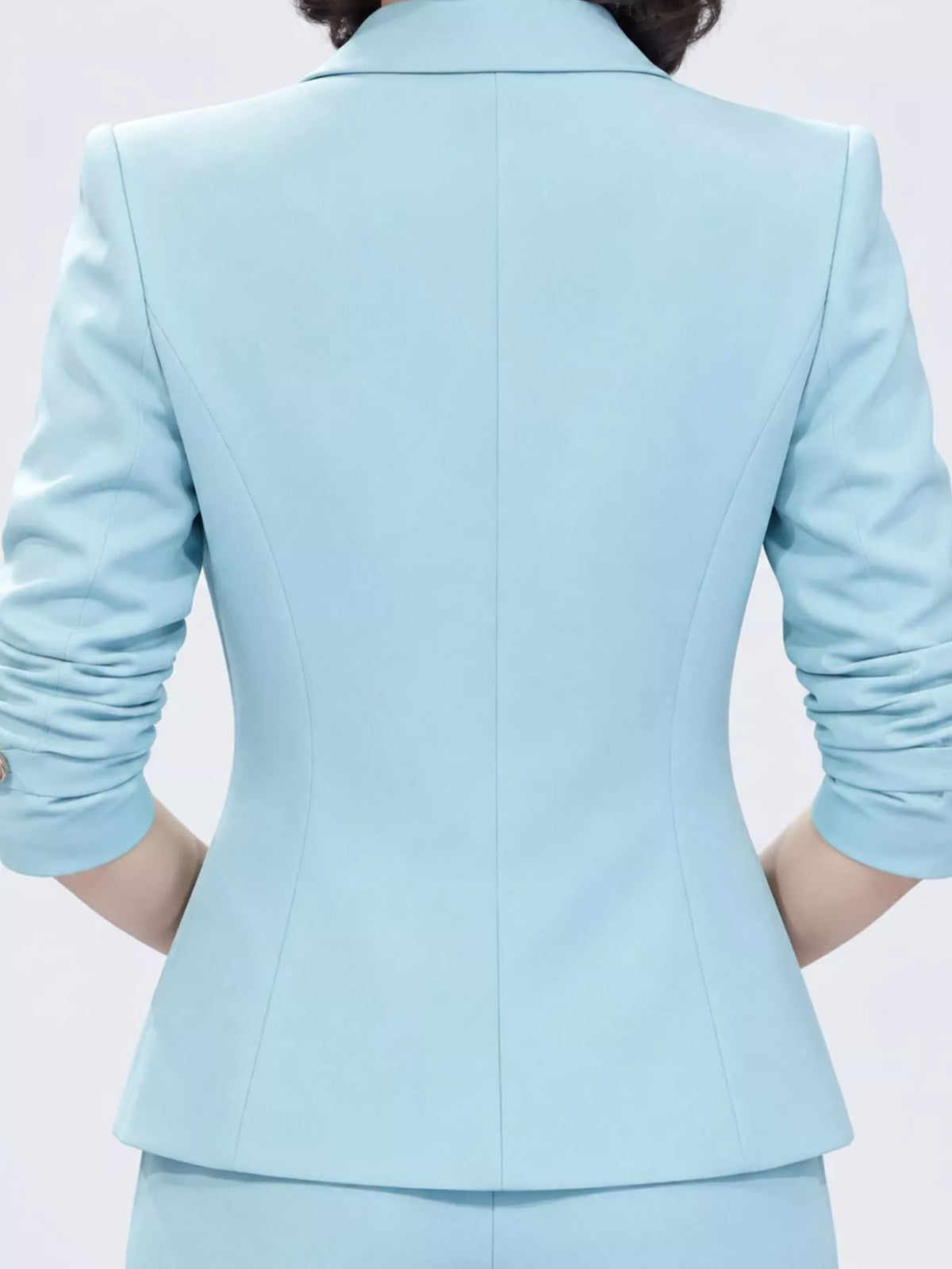 Blue double-breasted lapel blazer and pants set, back view
