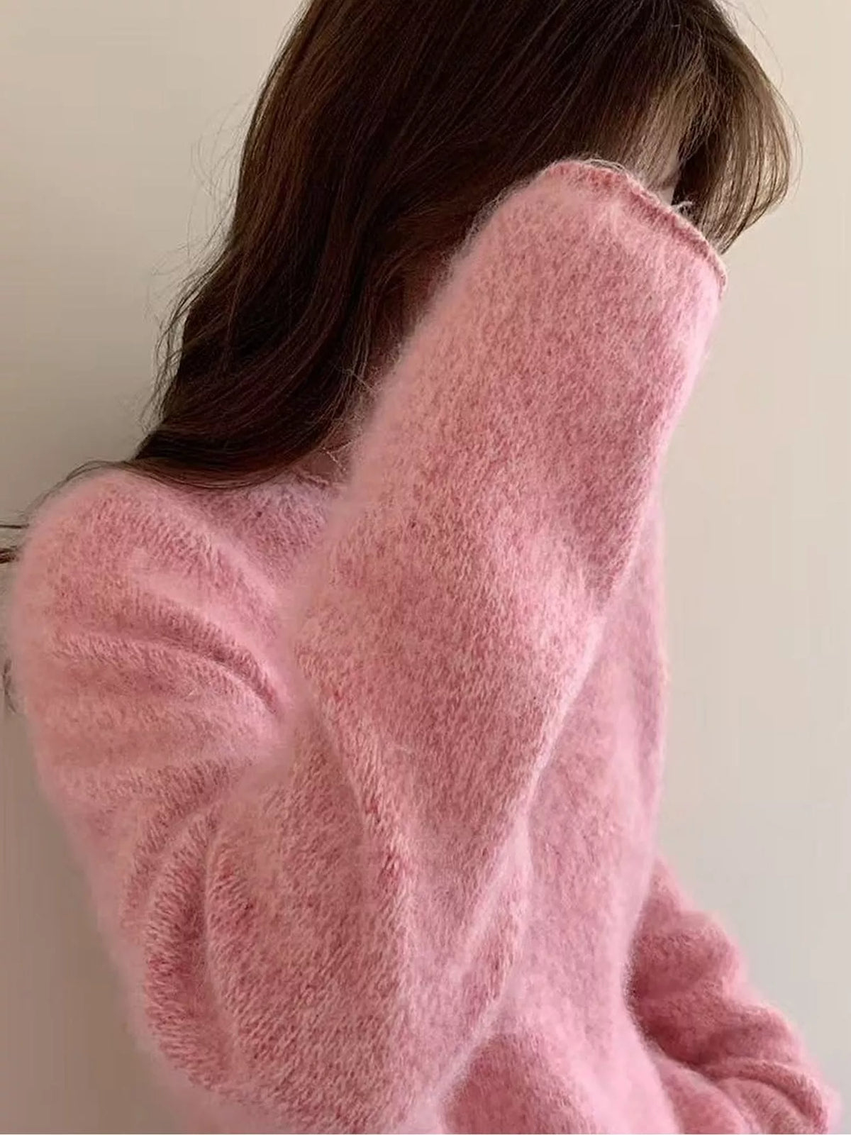Round neck long sleeve sweater, side view