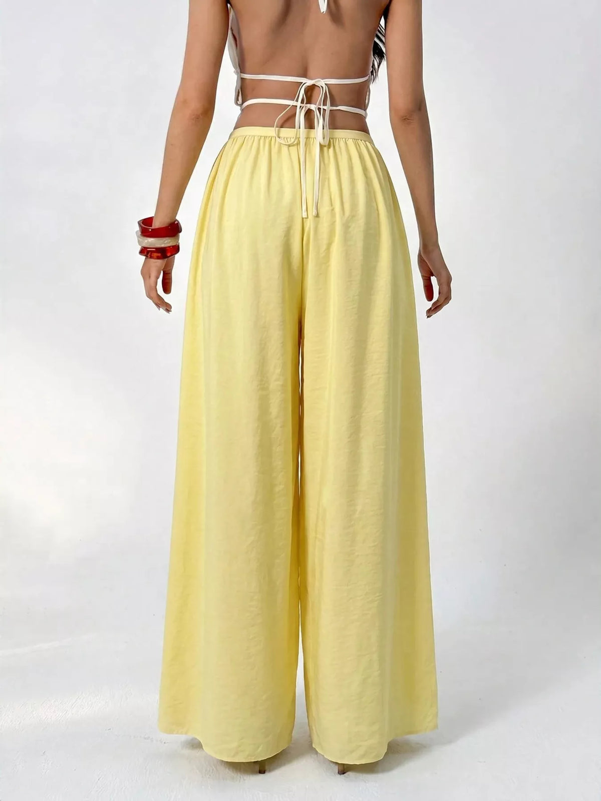 High-Waisted Pleated Wide-Leg Trousers, back view