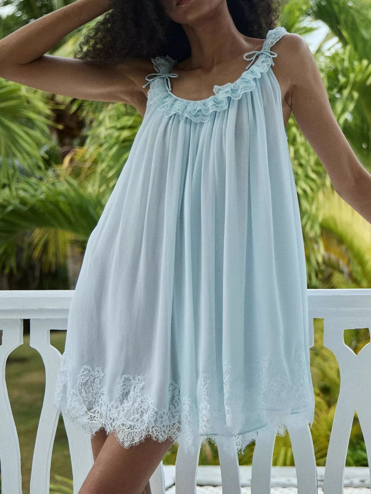 Round neck sleeveless mini dress, front view on model