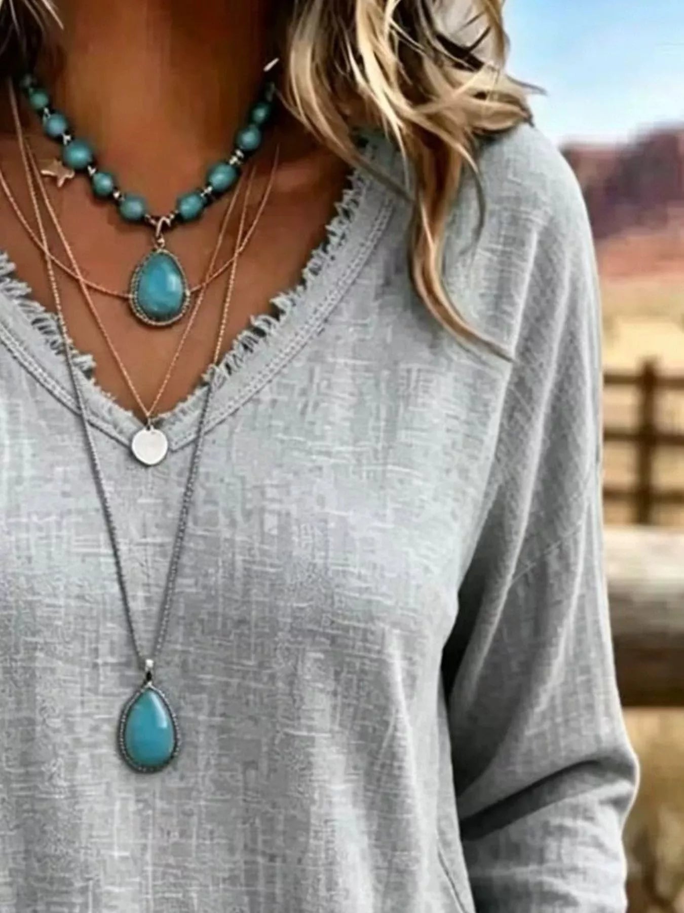 Trendsi V-Neck Long Sleeve Blouse with Frayed Hem Detail -