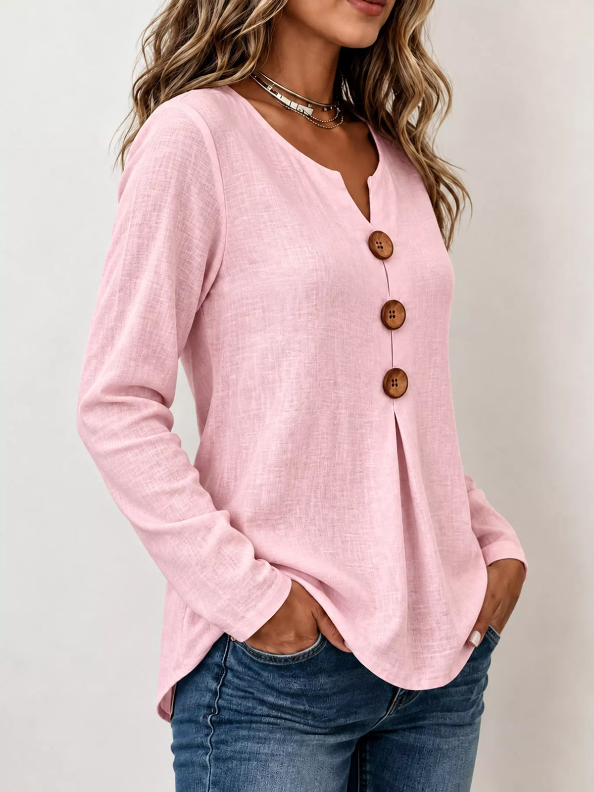 Pink long sleeve decorative button blouse