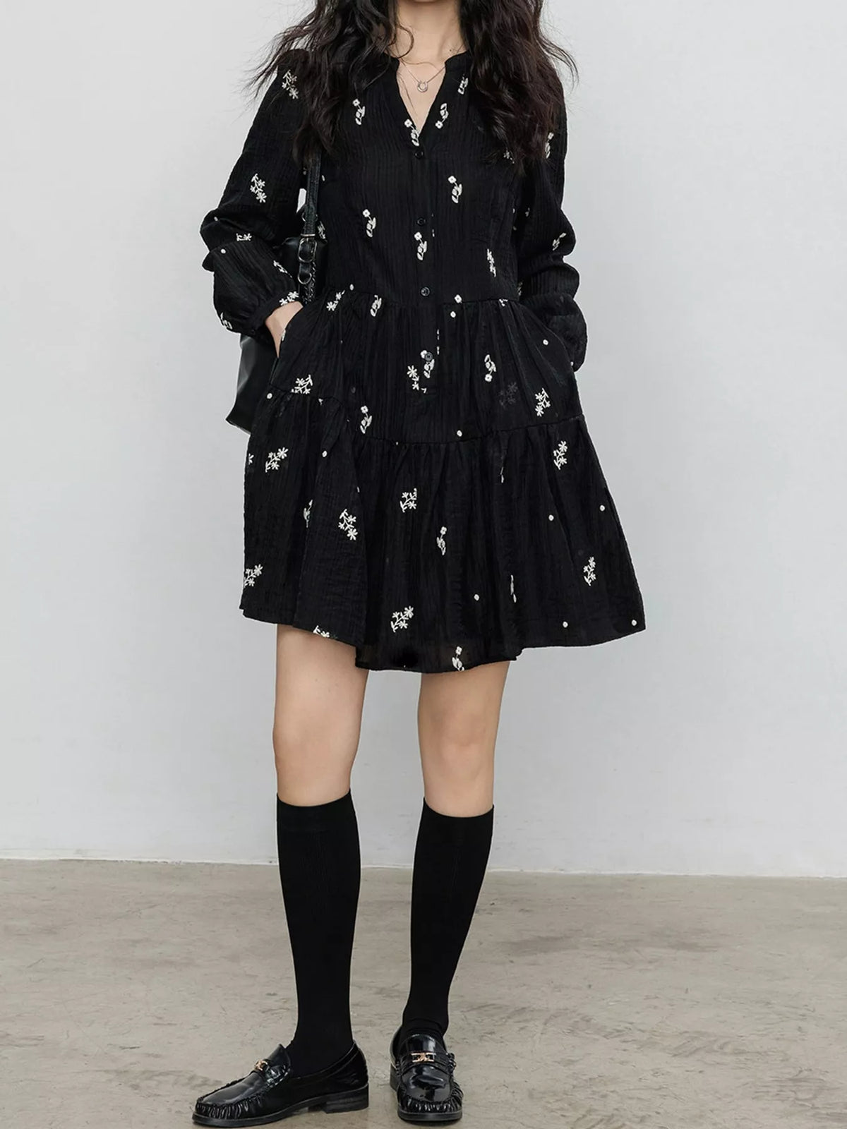 Women's Floral Long Sleeve Mini Dress in black floral — front view