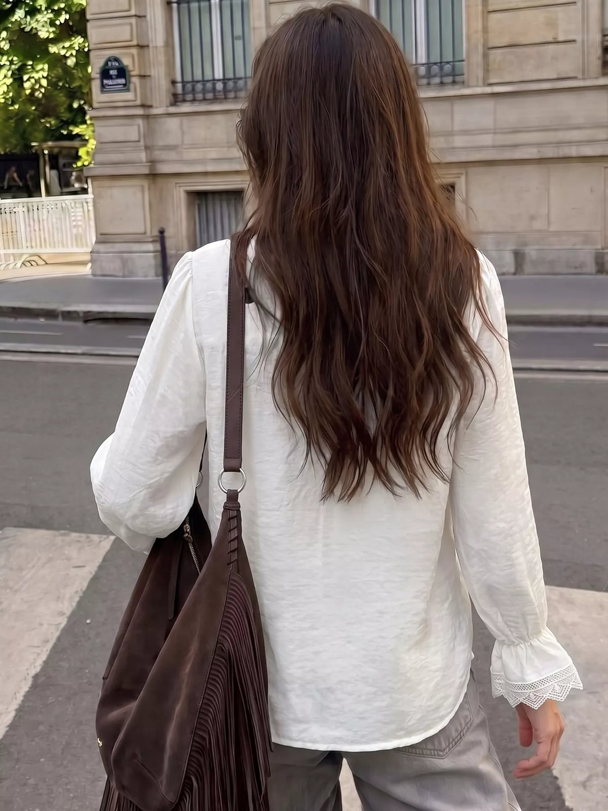 White lace-trimmed button-down shirt, back view